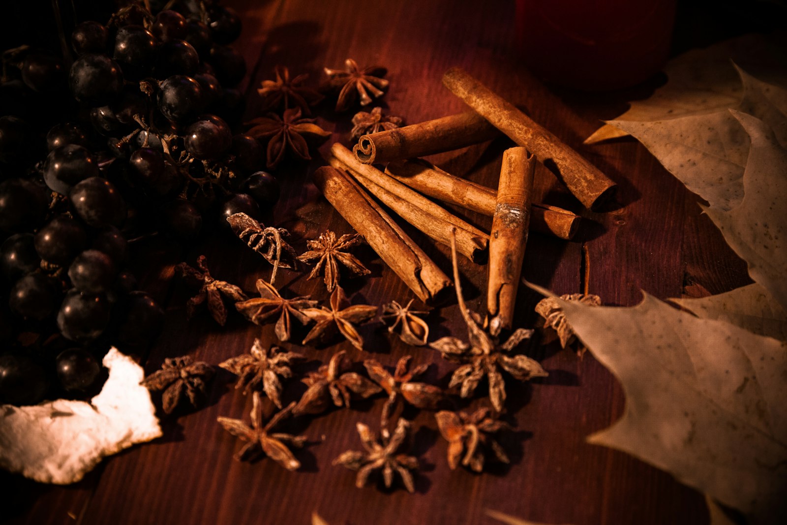 Cinnamon sticks and star anise on a wooden table
