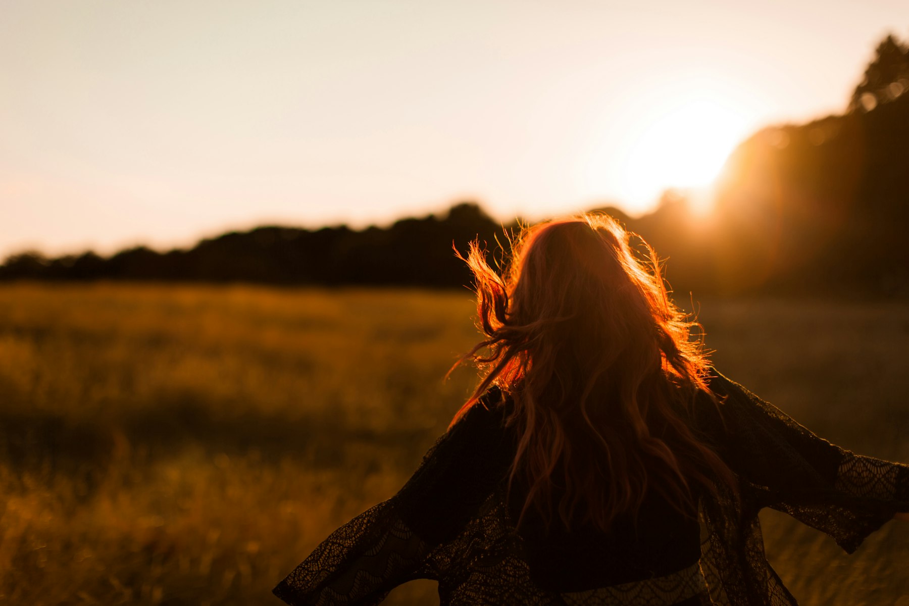 Portrait in a field at golden hour