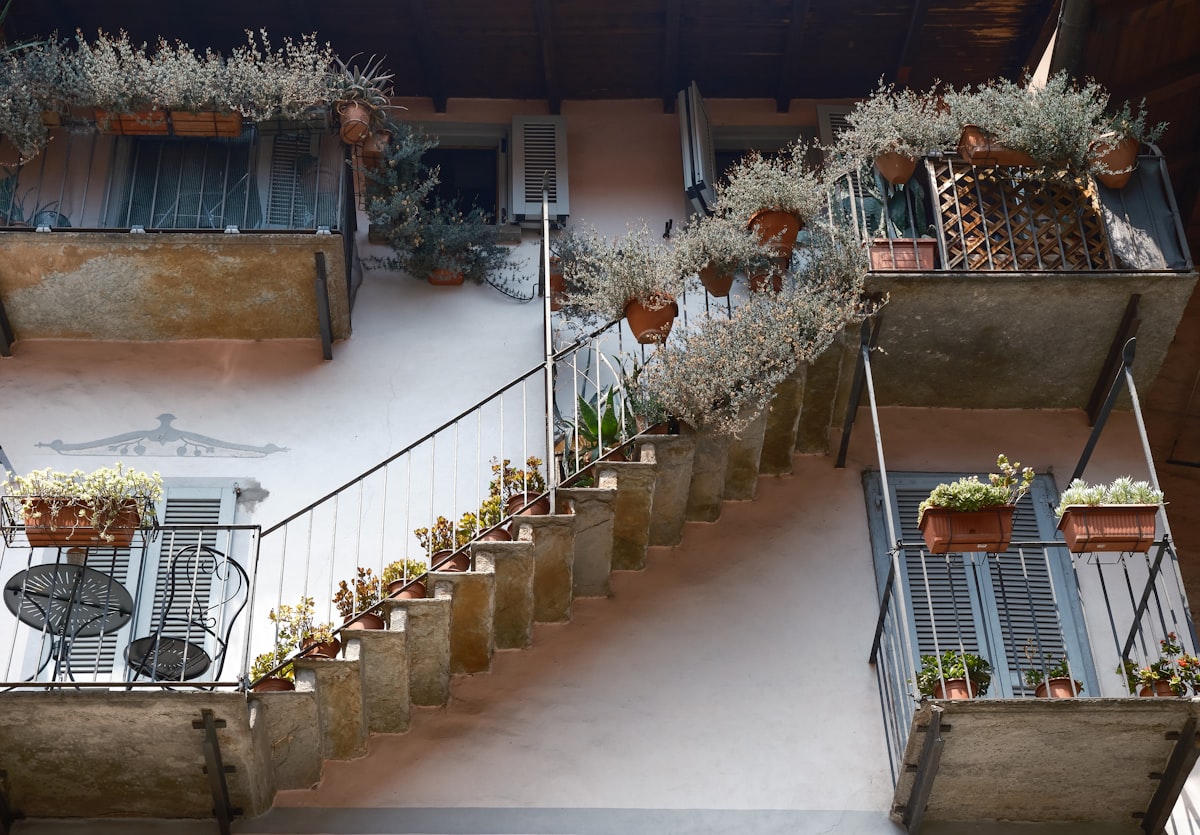 Balconies full of potted plants